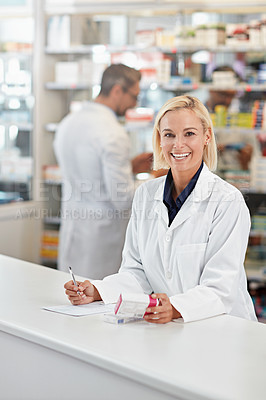 Buy stock photo Portrait of pharmacist woman writing medicine notes, product or healthcare receipt signature in pharmacy trust. Inventory box, stock help desk and medical professional worker, sign prescription paper