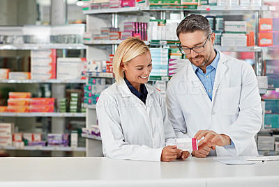 Buy stock photo Pharmacy, medicine and pharmacist people for stock check, reading label and healthcare inventory. Product shelf, pills or tablet box and medical expert advice to retail worker, teamwork and help desk