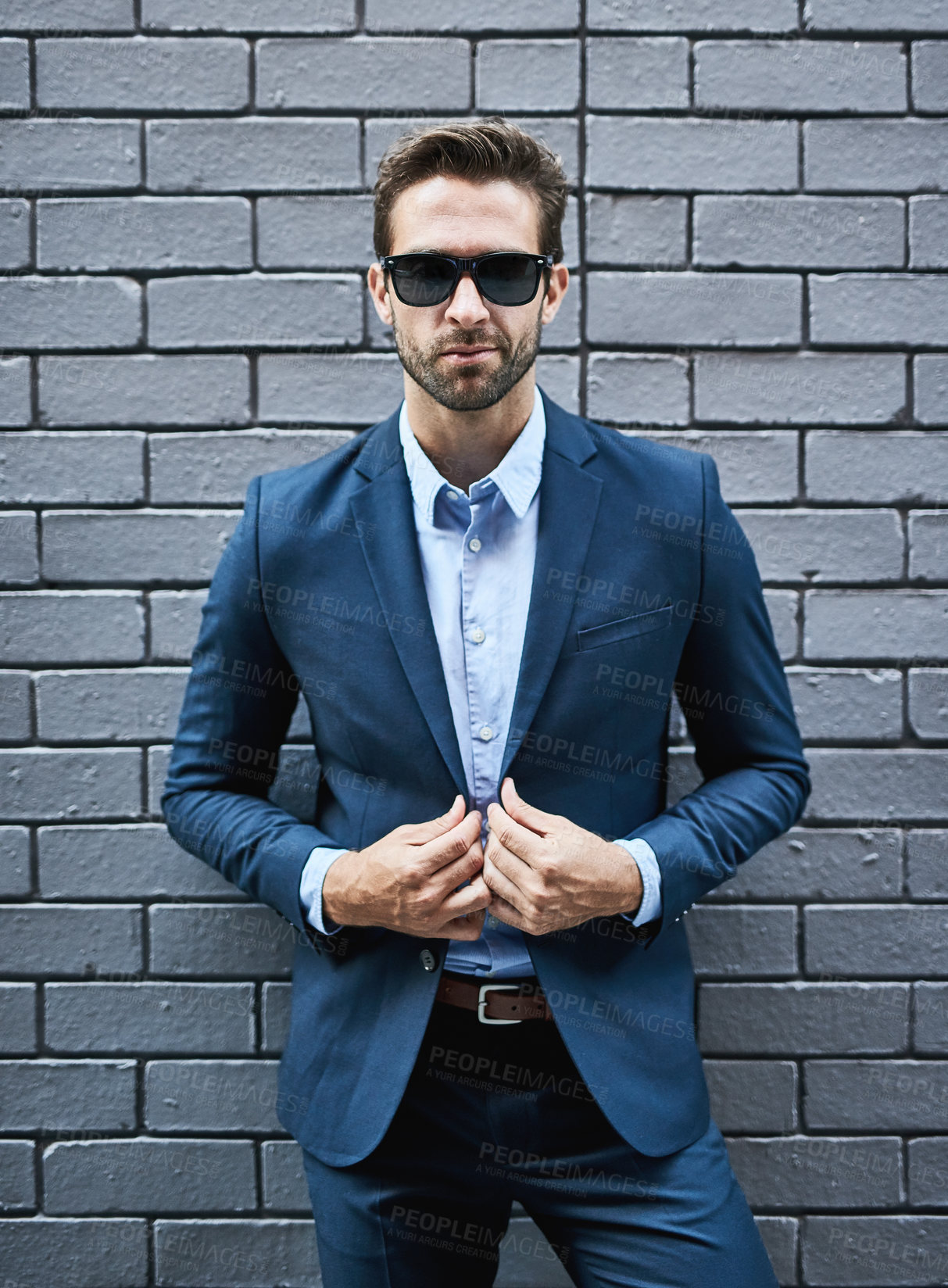 Buy stock photo Fashion, sunglasses and business man by brick wall in Canada for company success, professional goals or targets, mission or vision. Portrait, boss and happy ceo standing against street wall outdoors.