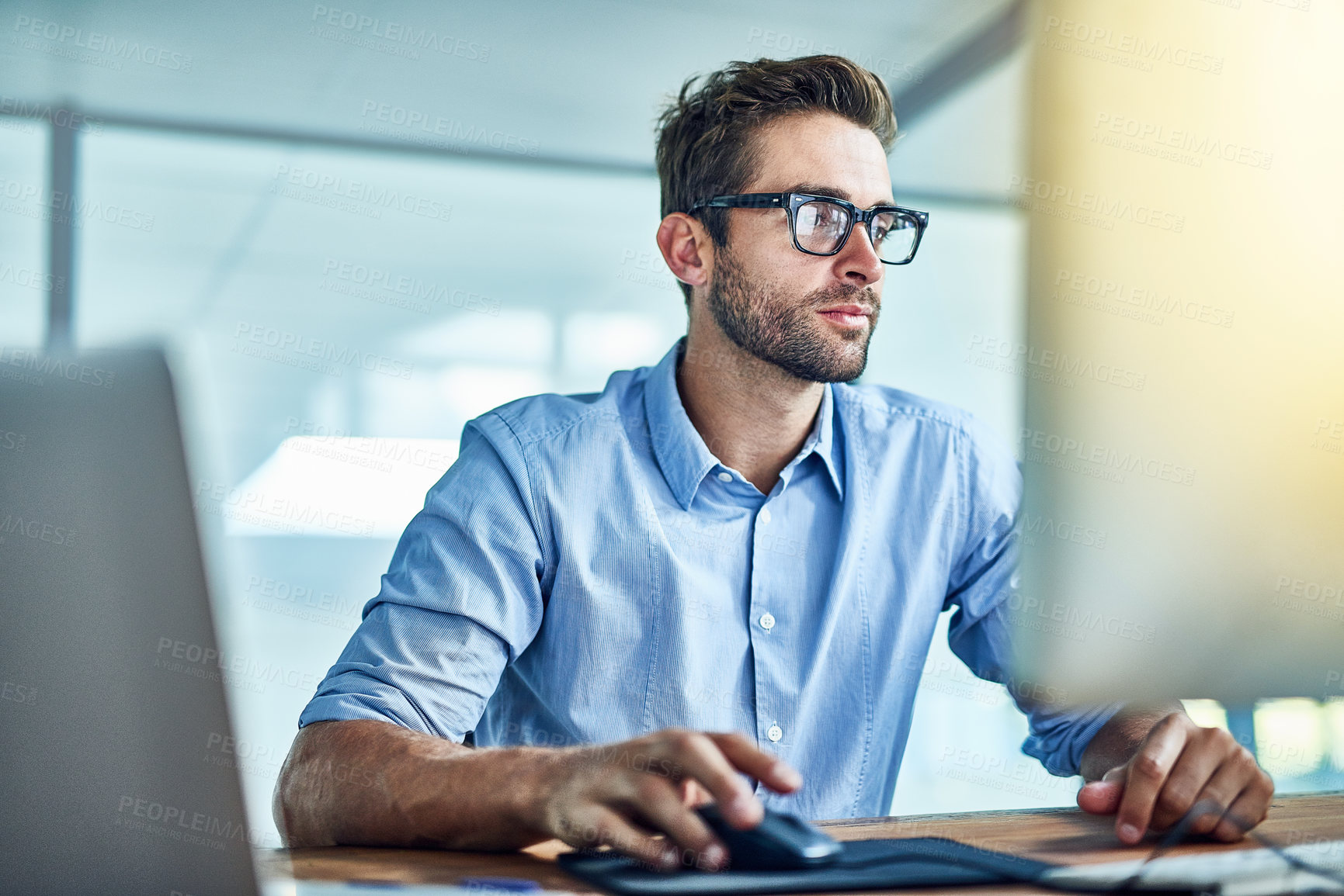 Buy stock photo Computer, employee and man in office, copywriter and smile for job, startup and workplace of business. Happiness, staff and person with technology, desktop and glasses with confidence and pride