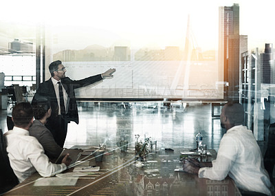 Buy stock photo Multiple exposure shot of businesspeople in a meeting superimposed on a cityscape