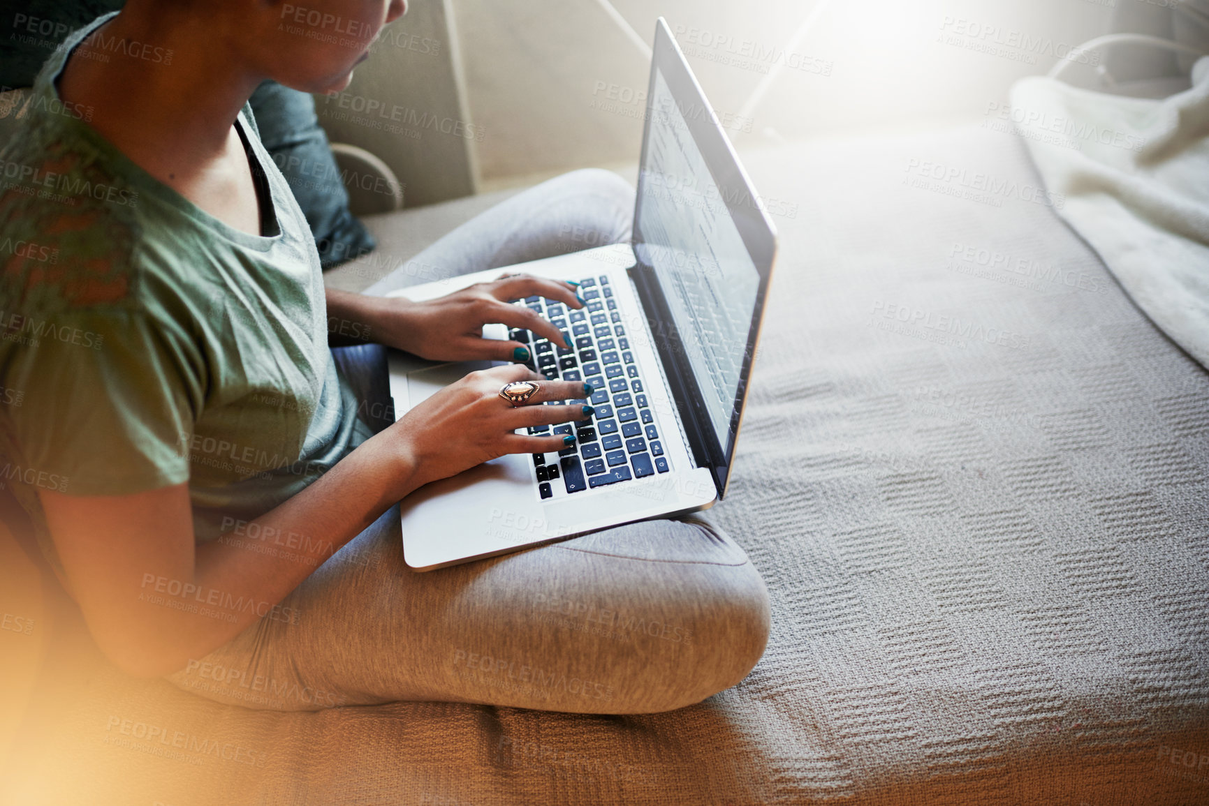 Buy stock photo High angle shot of a young female student studying at home