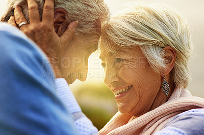 Buy stock photo Love, forehead and senior couple outdoor, relationship and romance with happiness, retirement and bonding. Partners, mature man and old woman in a park, hug and retired with marriage and anniversary