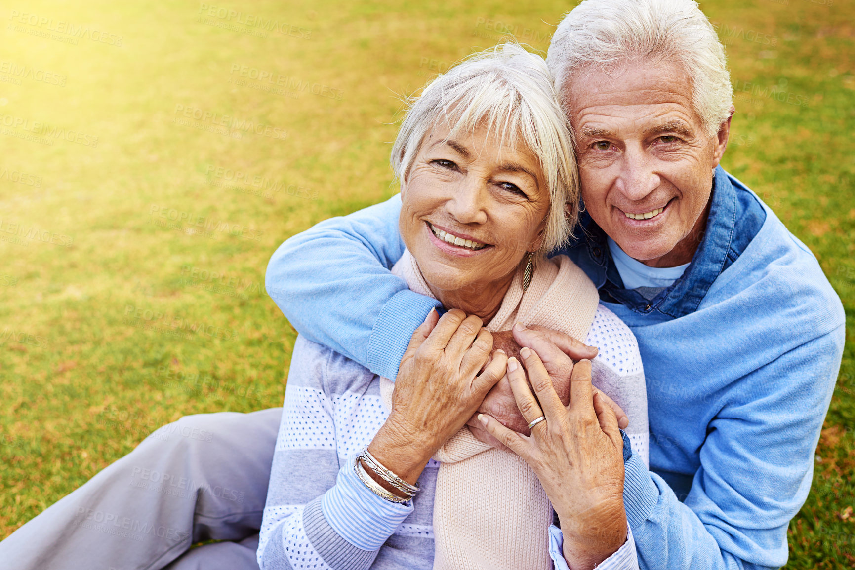 Buy stock photo Portrait of a senior couple enjoying the day together in a park