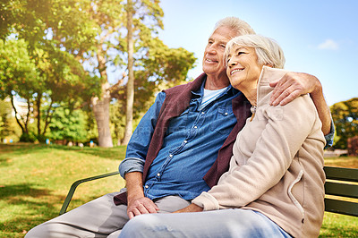 Buy stock photo Park, thinking and love with a senior couple sitting on a bench together on a summer day for romance. Nature, garden or memory with a mature man and woman bonding outdoor during retirement