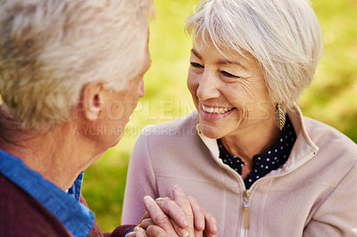 Buy stock photo Shot of a happy senior couple in the park