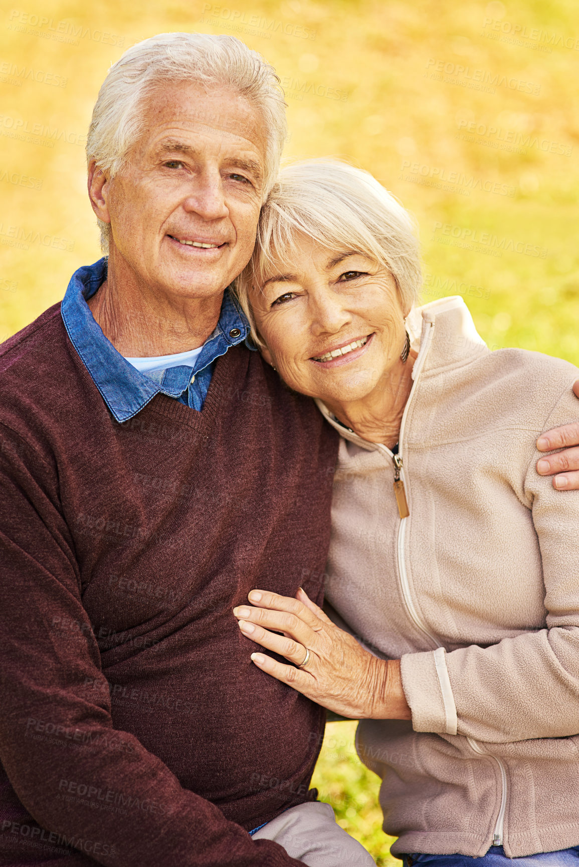 Buy stock photo Portrait of a happy senior couple in the park