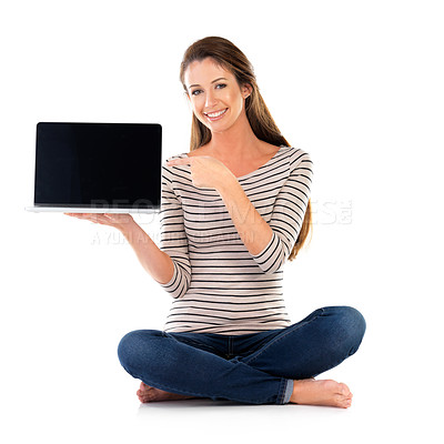 Buy stock photo Studio portrait of a young woman using a laptop against a white background