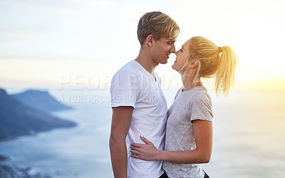 Buy stock photo Cropped shot of a young couple on a hike