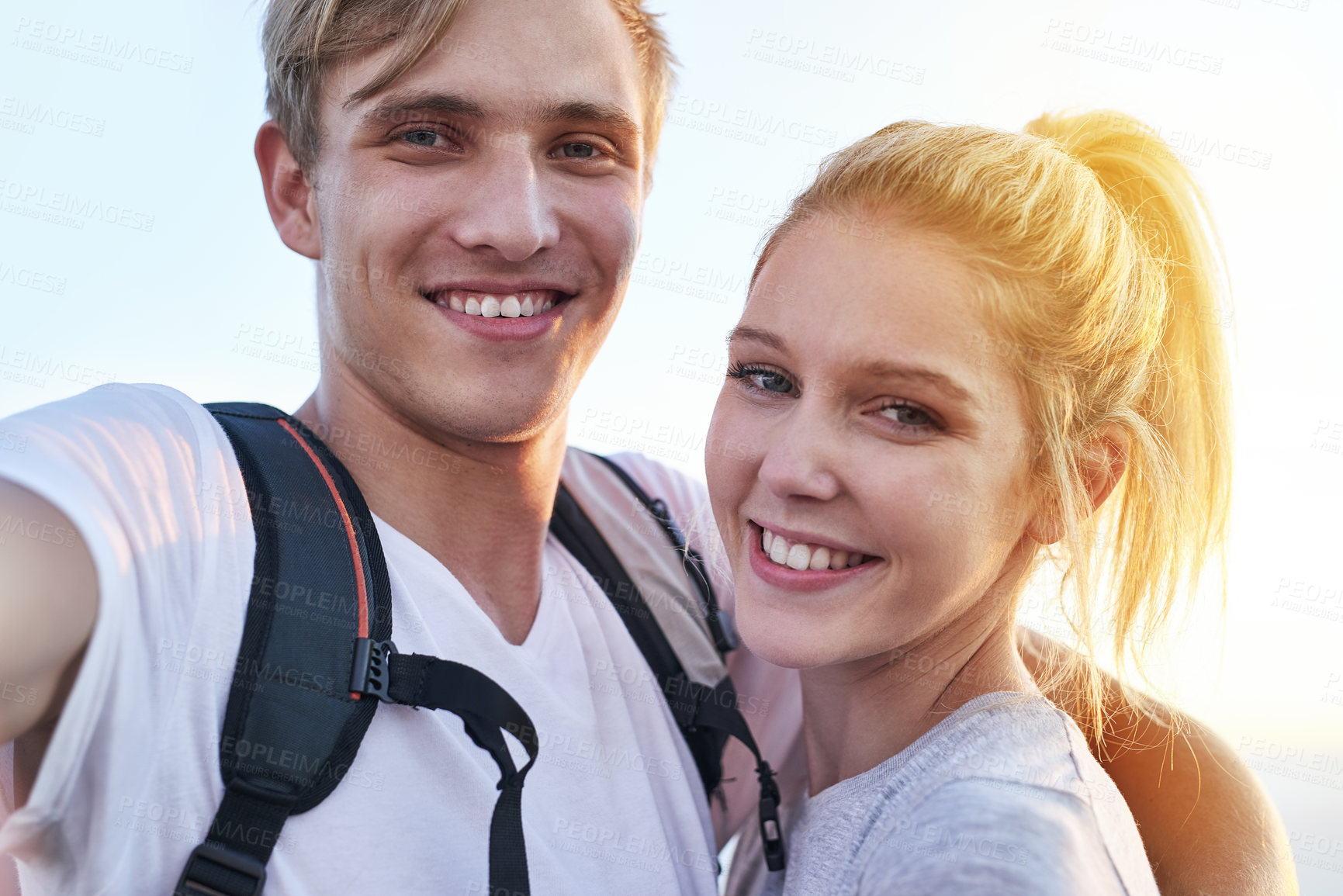 Buy stock photo Cropped portrait of a young couple on a hike