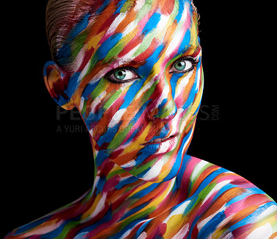 Buy stock photo Cropped portrait of a young woman posing with paint on her face