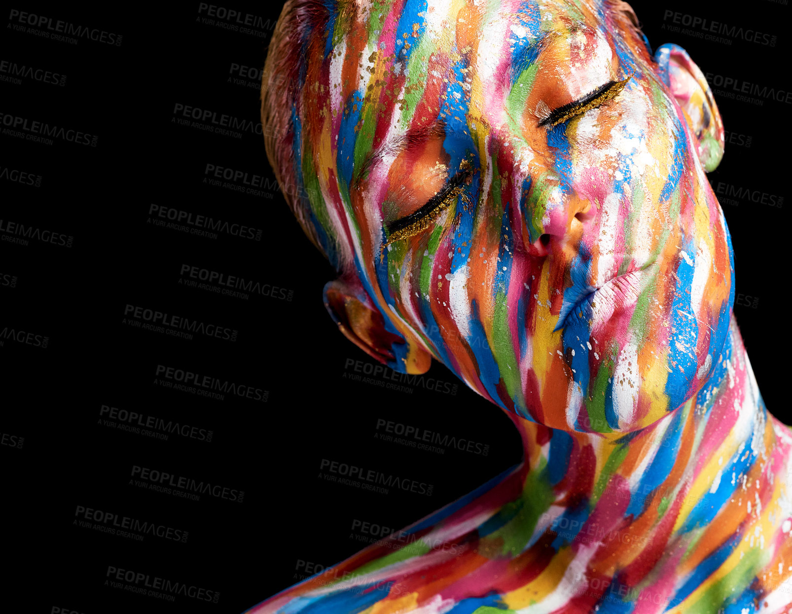 Buy stock photo Cropped shot of a young woman posing with paint on her face