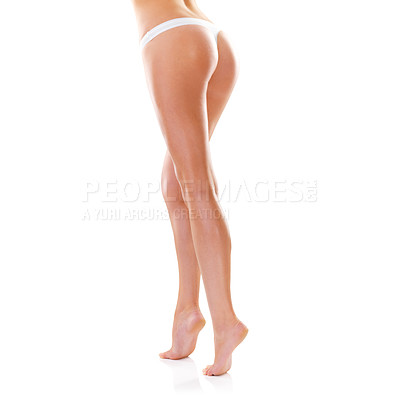 Buy stock photo Woman, legs and body care in studio, grooming and skincare for smooth skin on white background. Female person, mockup space and cosmetics treatment or dermatology, hair removal and underwear