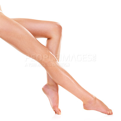 Buy stock photo Legs, skin and beauty of feet in studio for shaving, cleaning or waxing for grooming isolated on a white background. Foot, knee and person in epilation, pedicure and natural hair removal treatment