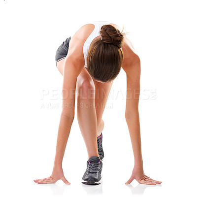 Buy stock photo Woman, start or runner in studio for exercise, fitness training or cardio workout on white background. Marks, girl or athlete on ground for sports performance, sprinting contest or running endurance
