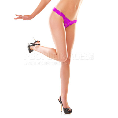 Buy stock photo Crop shot of a young woman wearing ping underwear against a white background