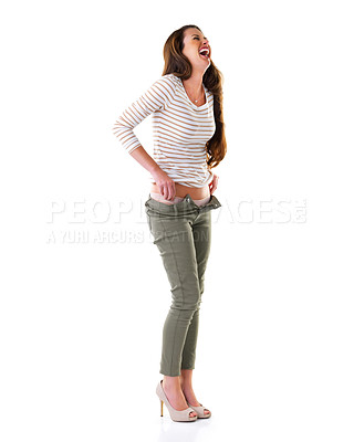 Buy stock photo Woman, fashion and laugh in studio for casual, pants and cool clothes on white background. Female person, smile and jeans with humour, happiness and comedy on backdrop for apparel and mockup space