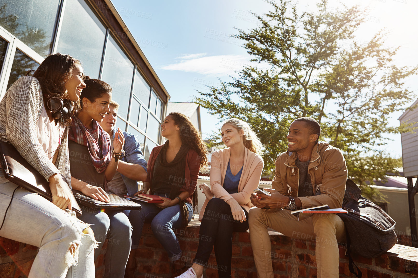 Buy stock photo Happy, laughing and diversity with students in college for study break, bonding and future. Learning, education and friends with group of people in outdoor campus for academy, scholarship and funny