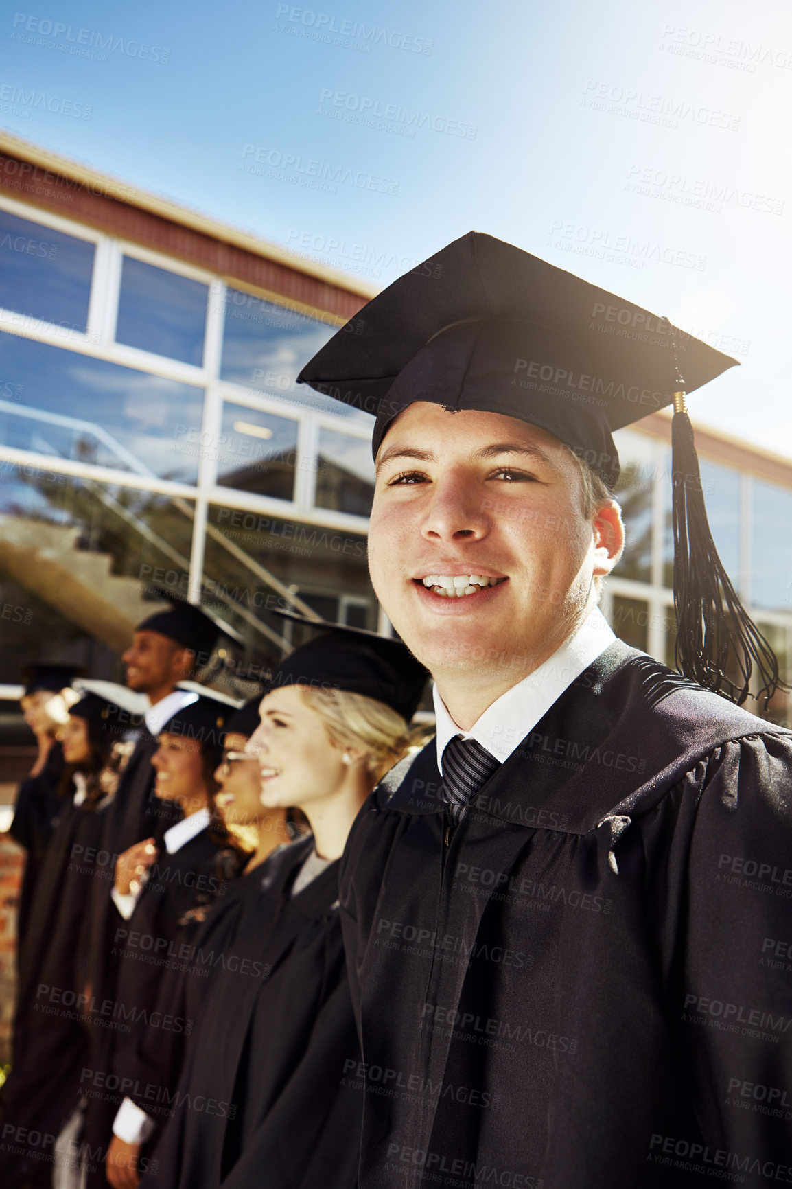 Buy stock photo Happy, man and portrait with graduation outdoor for education diploma, achievement and milestone. Proud, students and success with university award, announcement and learning goals of academic degree