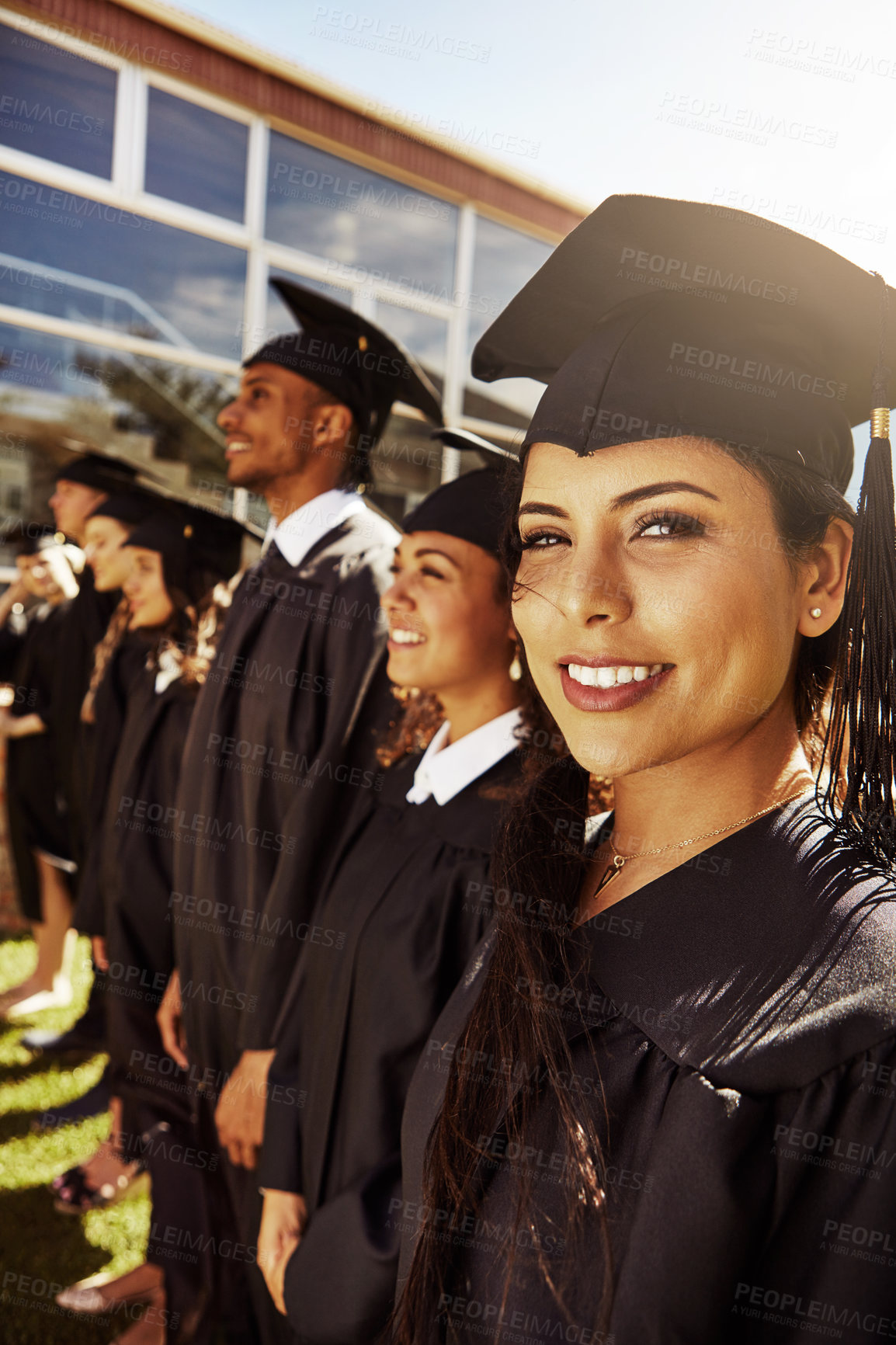 Buy stock photo Smile, girl and students at graduation outdoor for education diploma, achievement and milestone. Proud, people and celebration for university award, announcement and learning goals of academic degree