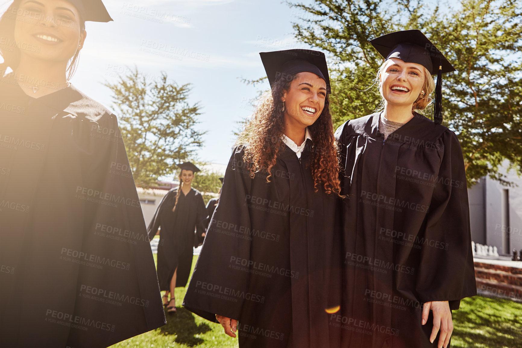 Buy stock photo Graduation, happy  and education with students in college for friends, scholarship and future. University degree, campus and achievement with people in outdoor for learning, studying and event