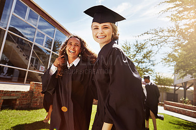 Buy stock photo Portrait of a group of smiling university students outside on graduation day