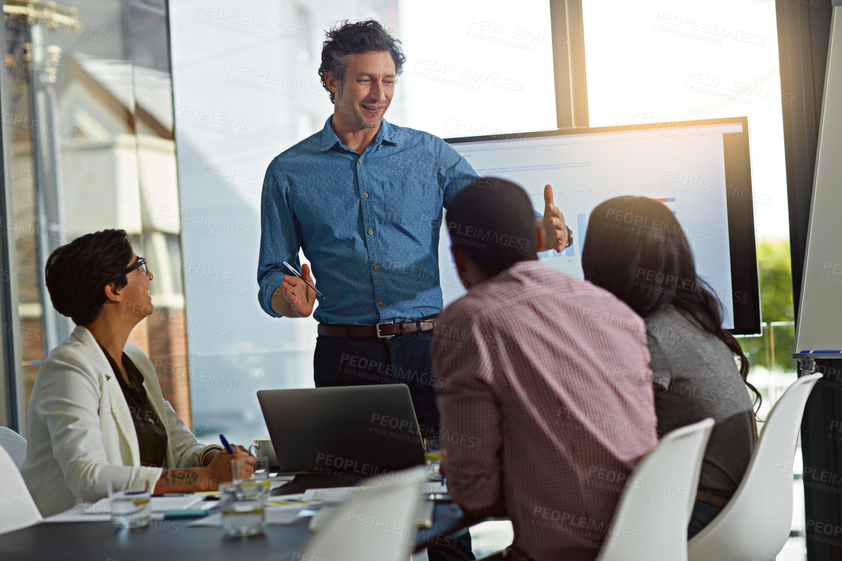 Buy stock photo Happy man, coach and meeting with laptop for project discussion, company expansion or growth at office. Man, mentor or speaker training staff with explanation for presentation, report or development