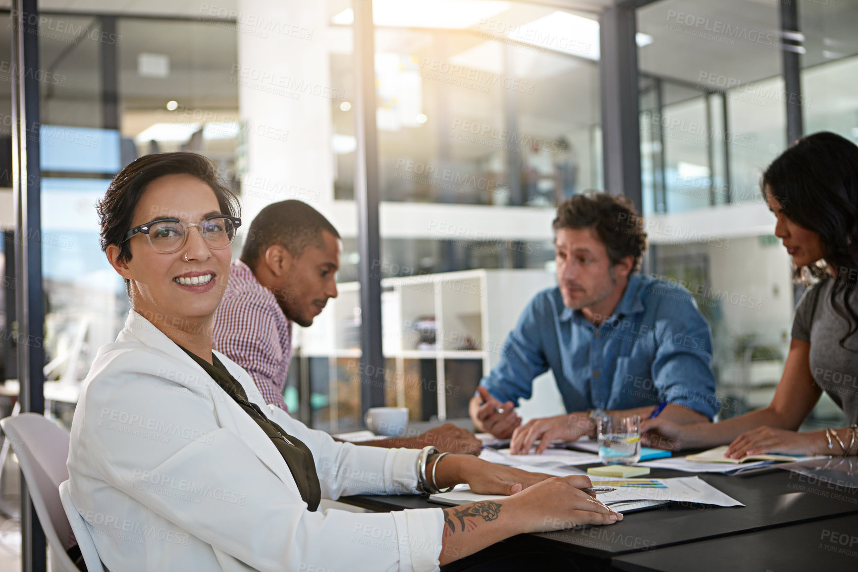 Buy stock photo Collaboration, meeting and portrait of business woman in boardroom with colleagues for planning. Development, smile and workshop with employee people in office together for feedback or review