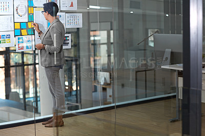 Buy stock photo Woman, sticky notes and office for thinking on strategy, problem solving and vision for campaign. Female person, contemplating statistics and glass wall for solution, brainstorming and mood board