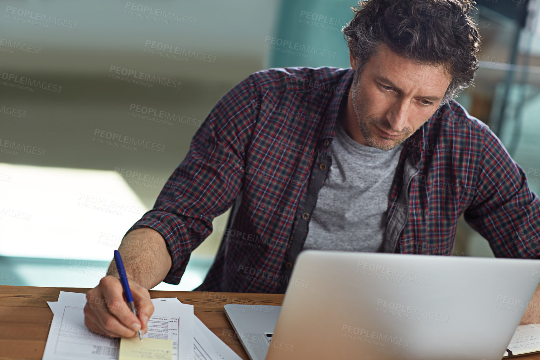 Buy stock photo Man, laptop and writing in office for planning, business schedule and research information. Mature administrator, tech and sticky note in startup agency for reminder, online tasks and daily agenda