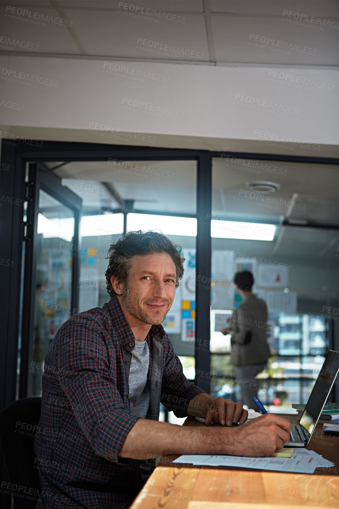 Buy stock photo Cropped portrait of a businessman working in his office