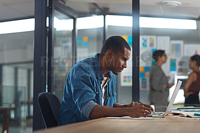 Buy stock photo Cropped shot of a businessman working in his office