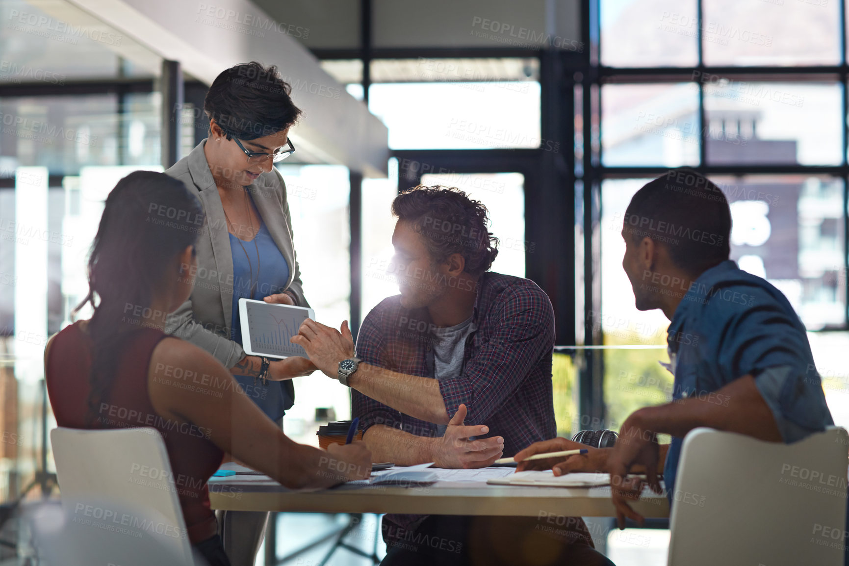 Buy stock photo Business people, tablet and discussion in collaboration, meeting or feedback as creative in office. Technology, group and diversity for teamwork, review and communication at company or digital agency