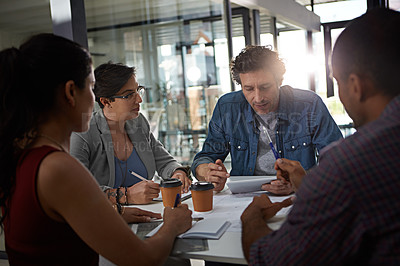 Buy stock photo Business people, paperwork and diversity in collaboration, meeting or feedback as creative in office. Group, document and discussion for teamwork, digital agency and mentorship in employee engagement