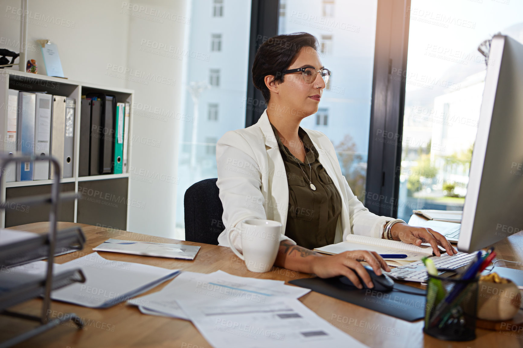Buy stock photo Computer, working and business woman in office typing online documents, website research and writing email. Corporate networking, and busy female employee at desk with focus, planning and ideas