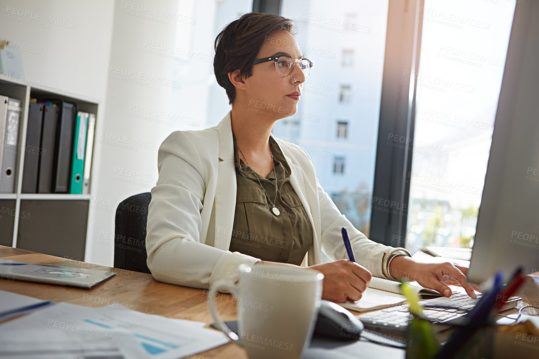 Buy stock photo Computer, writing and research with business woman in office for account manager, reading and email. Investment banker, budget notebook and online portfolio with person in agency for trading broker