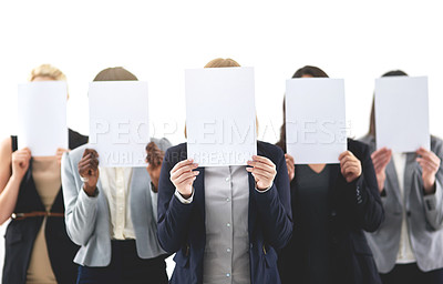 Buy stock photo Shot of businesspeople each holding a blank board in front of their faces