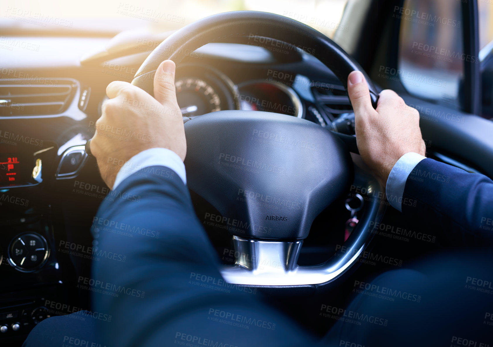 Buy stock photo Shot of a businessman driving his car