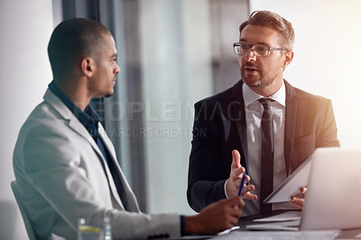 Buy stock photo Business people, talking and tablet for planning online with partner for marketing strategy. Men in management speaking and discussion at table about ideas for corporate collaboration in office