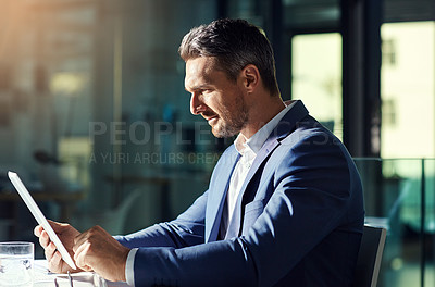 Buy stock photo Search, serious and tablet with businessman in office for planning, analytics and digital marketing. Creative, strategy and technology with employee reading online news for idea, report or data