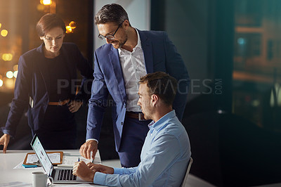 Buy stock photo Business people, laptop and meeting working at night in office for big data collaboration, planning overtime and report deadline. Teamwork, late and digital tech conversation with web design leader
