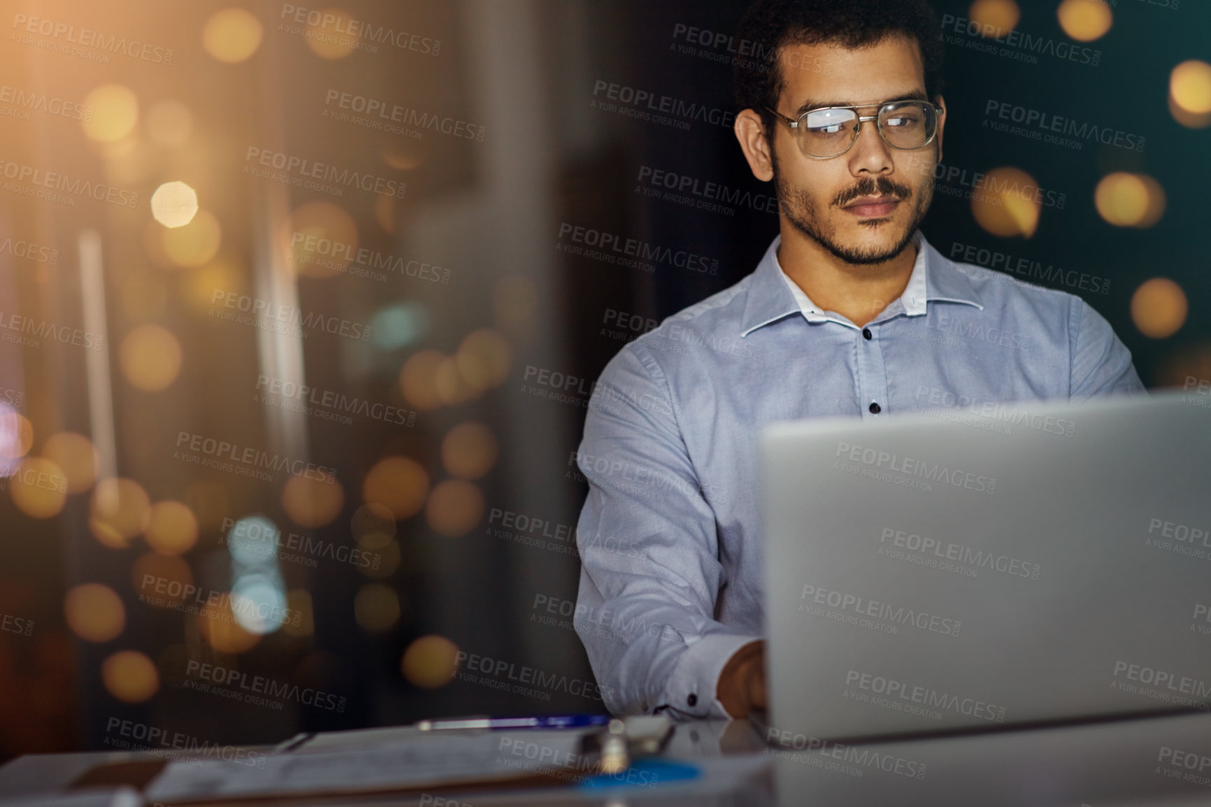 Buy stock photo Businessman, night and accountant on laptop for investing, news research and budget for profit. Economy growth, bokeh and financial advisor on technology for network, typing and accounting report