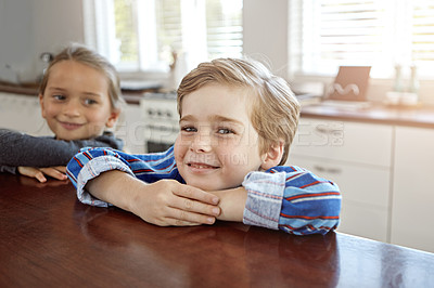 Buy stock photo Shot of a brother and sister at home