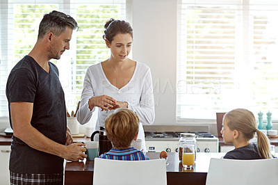 Buy stock photo Shot of a family having breakfast together