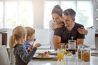 Buy stock photo Shot of a family having breakfast together