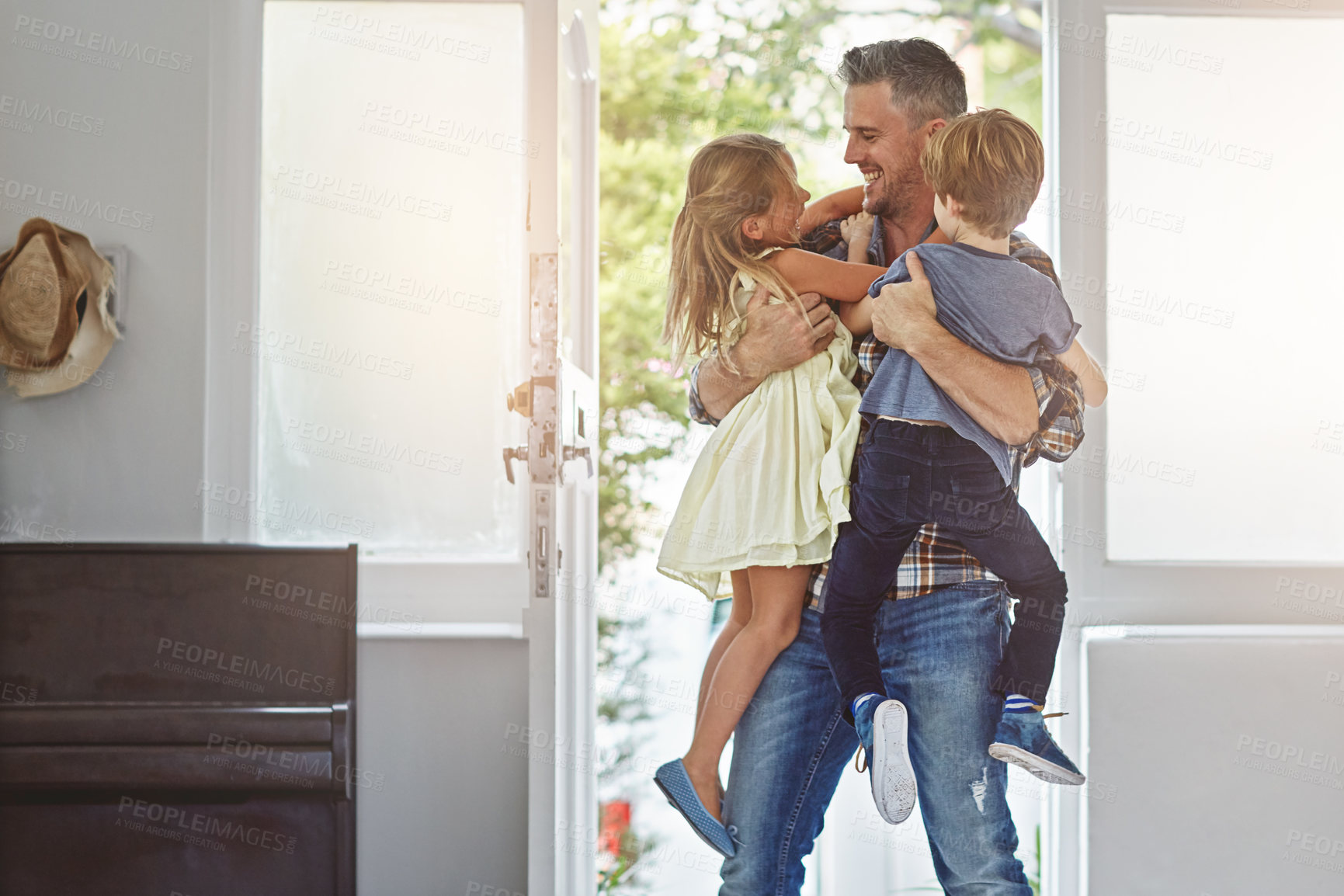 Buy stock photo Family, father and children with hug and fun, love and hello at door with happiness in family home. Happy people, parent and kids with care, lifestyle and wellness with bond and excited together