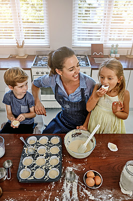 Buy stock photo Shot of a mother baking in the with her daughter