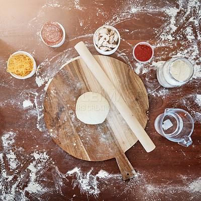 Buy stock photo High angle shot of baking ingredients on a kitchen counter