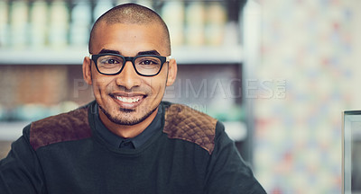 Buy stock photo Portrait of a young man sitting in a cafe