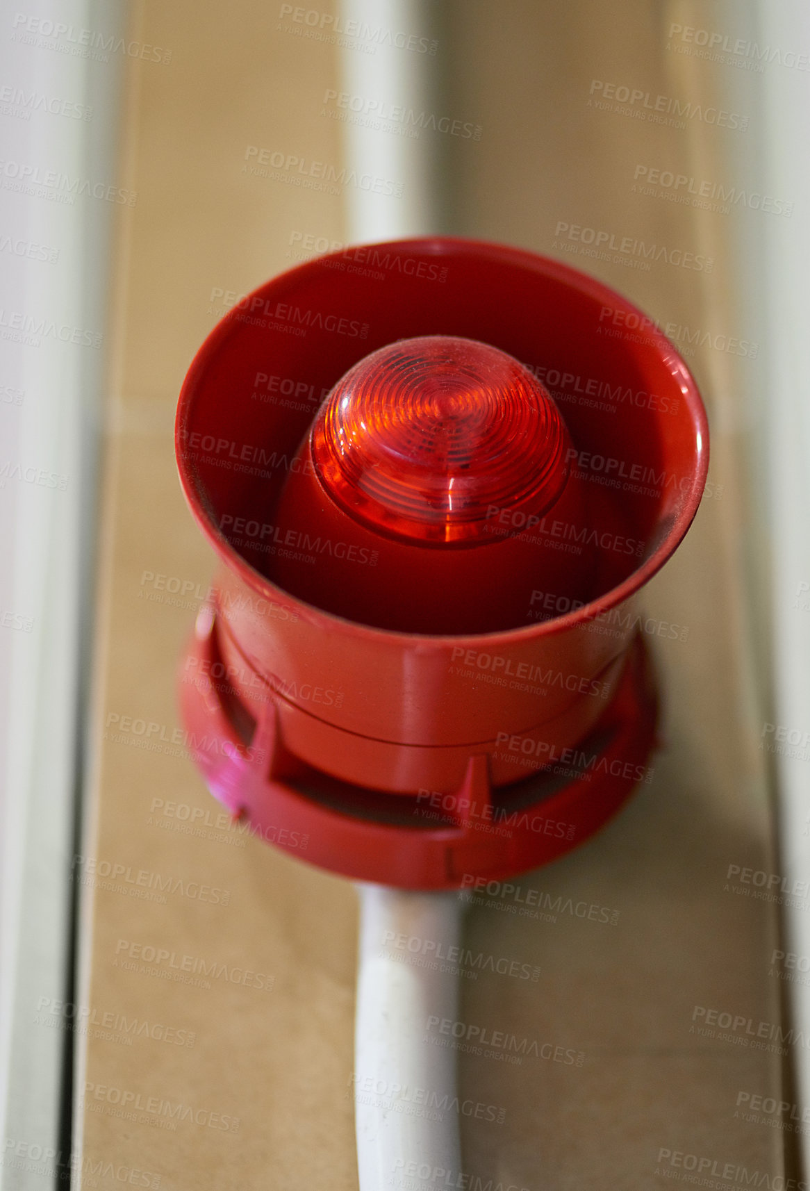 Buy stock photo Emergency, siren and speaker for fire alarm, warning and evacuation with safety regulations or compliance. Red light on wall for security alert, noise and danger with sound, electricity and risk